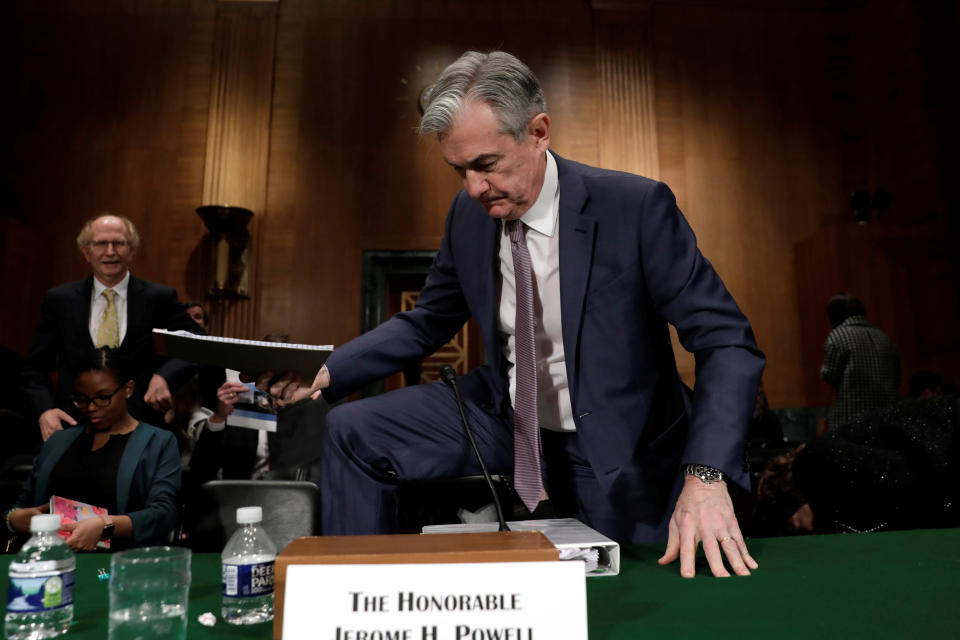 Federal Reserve Board Chairman Jerome Powell steps over a chair after a Senate Banking Committee hearing on The Semiannual Monetary Policy Report to the Congress on Capitol Hill in Washington, U.S., February 12, 2020. REUTERS/Yuri Gripas