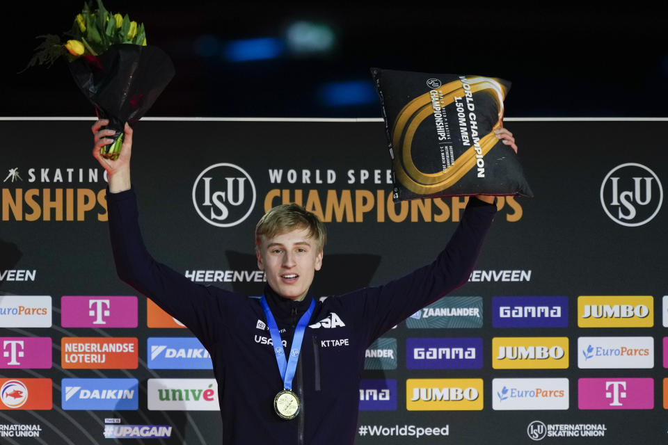 Jordan Stolz of the U.S. celebrates winning his third gold medal on the podium of the 1500m Men event of the Speedskating Single Distance World Championships at Thialf ice arena Heerenveen, Netherlands, Sunday, March 5, 2023. (AP Photo/Peter Dejong)