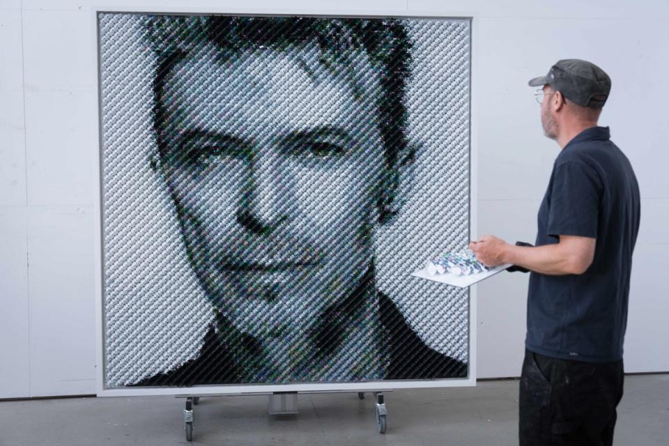 Artist Joe Black with his David Bowie portrait commissioned by Sky Arts. (Scott Garfitt/PinPep)