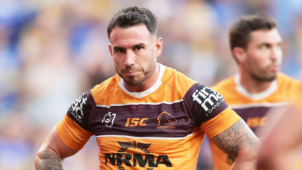 Pictured here, Darius Boyd looks dejected during an NRL match for the Broncos.