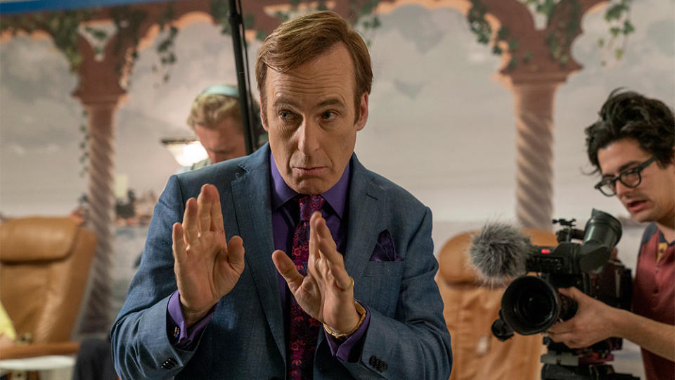 Bob Odenkirk as Jimmy McGill, Julian Bonfiglio as Sound Guy, Josh Fadem as Camera Guy - Better Call Saul _ Season 5, Episode 6 - Photo Credit: Greg Lewis/AMC/Sony Pictures Television