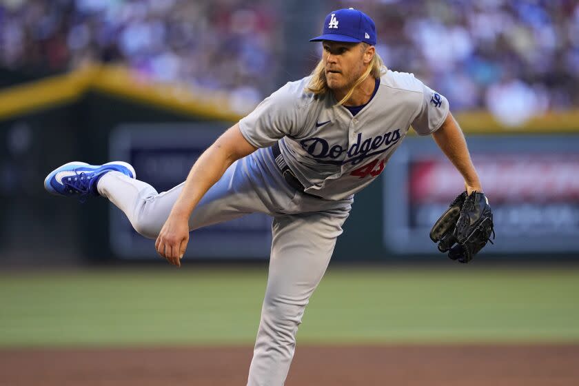 Los Angeles Dodgers starting pitcher Noah Syndergaard throws against the Arizona Diamondbacks.