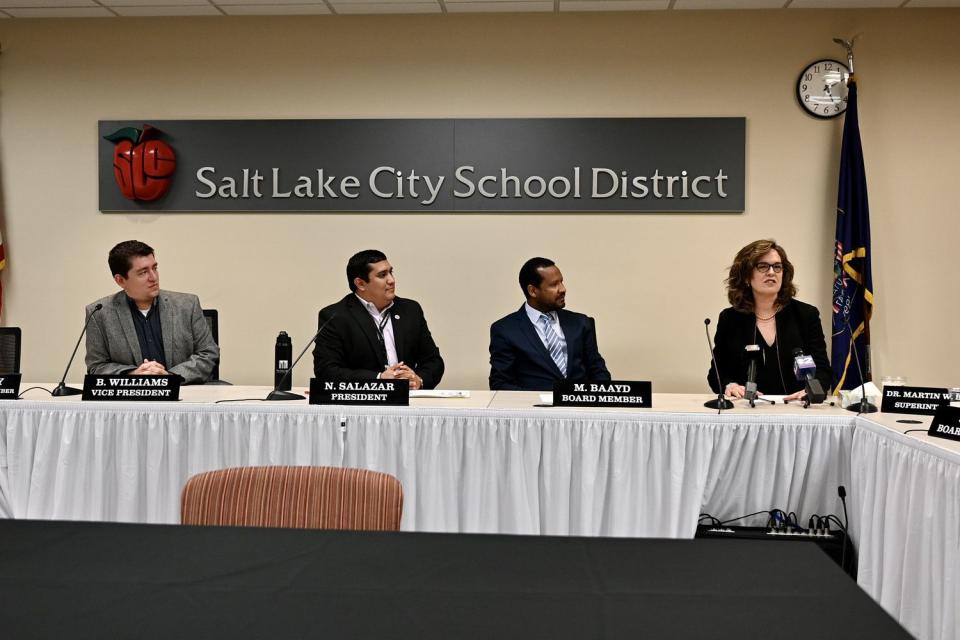 Salt Lake City School District board members Bryce Williams, Nate Salazar and Mohamed Baayd listen to Elizabeth Grant Thursday after she was named as district superintendent.