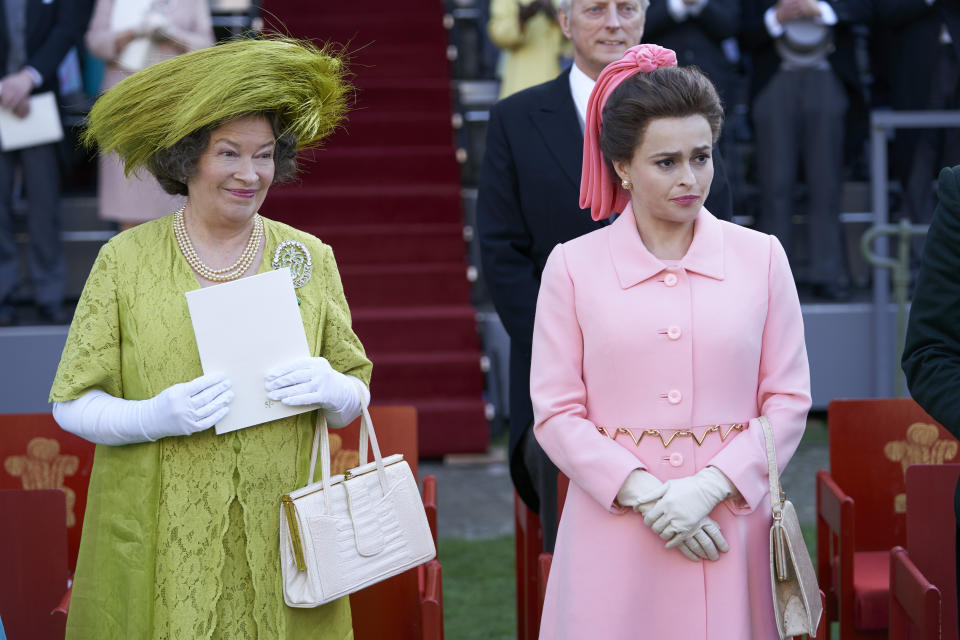 In this image released by Netflix, Marion Bailey portrays Queen Elizabeth the Queen Mother, left, and Helena Bonham Carter portrays Princess Margaret in a scene from the third season of "The Crown." On Monday, Dec. 9, 2019, Bonham Carter was nominated for a Golden Globe for best supporting actress in a series, limited series or TV movie. (Des Willie/Netflix via AP)