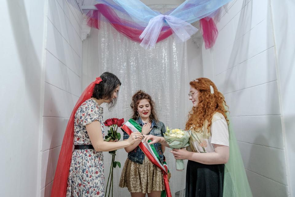 Lika and Fanny (right) at a secret vow ceremony with Ilka Dobrovits (centre) organiser and master of ceremonies. Hungary bans same-sex marriage (Getty Images)