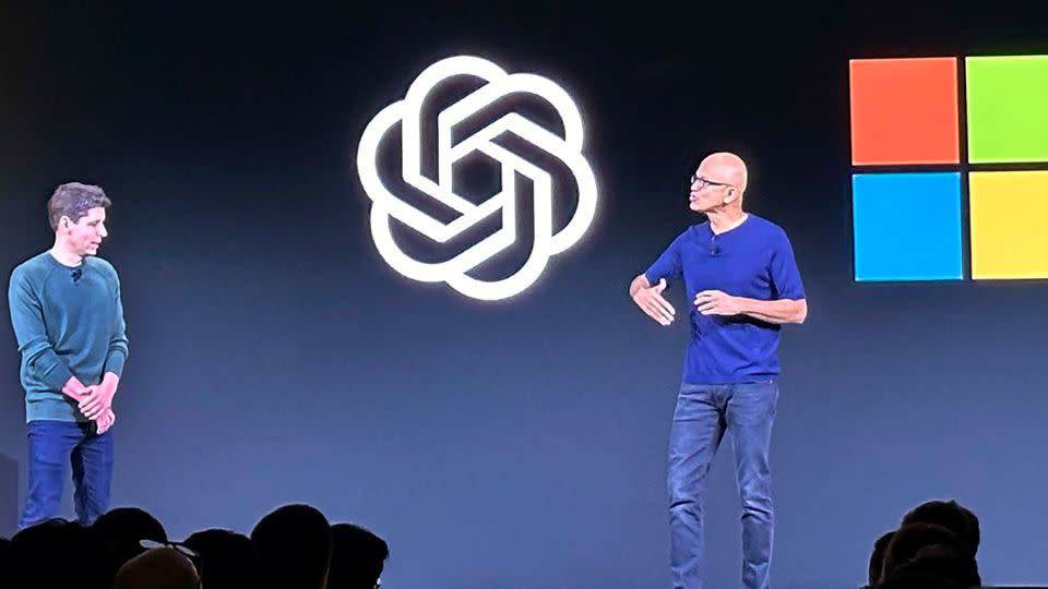 Sam Altman, left, appears onstage with Microsoft CEO Satya Nadella at OpenAI's first developer conference, on Nov. 6, 2023, in San Francisco. - Barbara Ortutay/AP/FILE