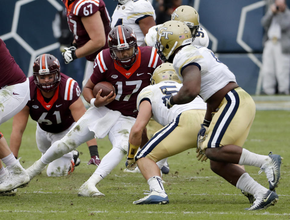 Virginia Tech quarterback Josh Jackson runs the ball in the fourth quarter of an NCAA college football game against Georgia Tech in Atlanta, Saturday, Nov. 11, 2017. (AP Photo/David Goldman)