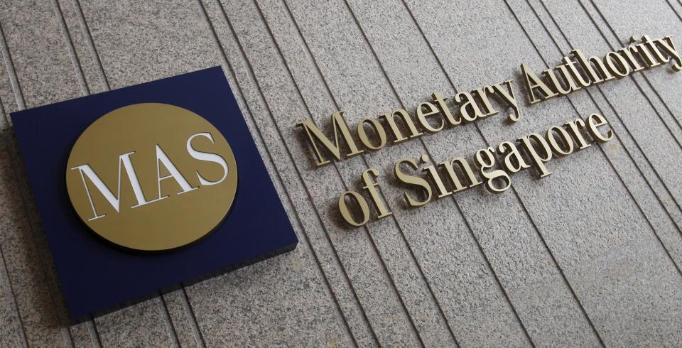 The logo of the Monetary Authority of Singapore (MAS) is pictured at its building in Singapore in this February 21, 2013 file photo.  REUTERS/Edgar Su/File Photo  