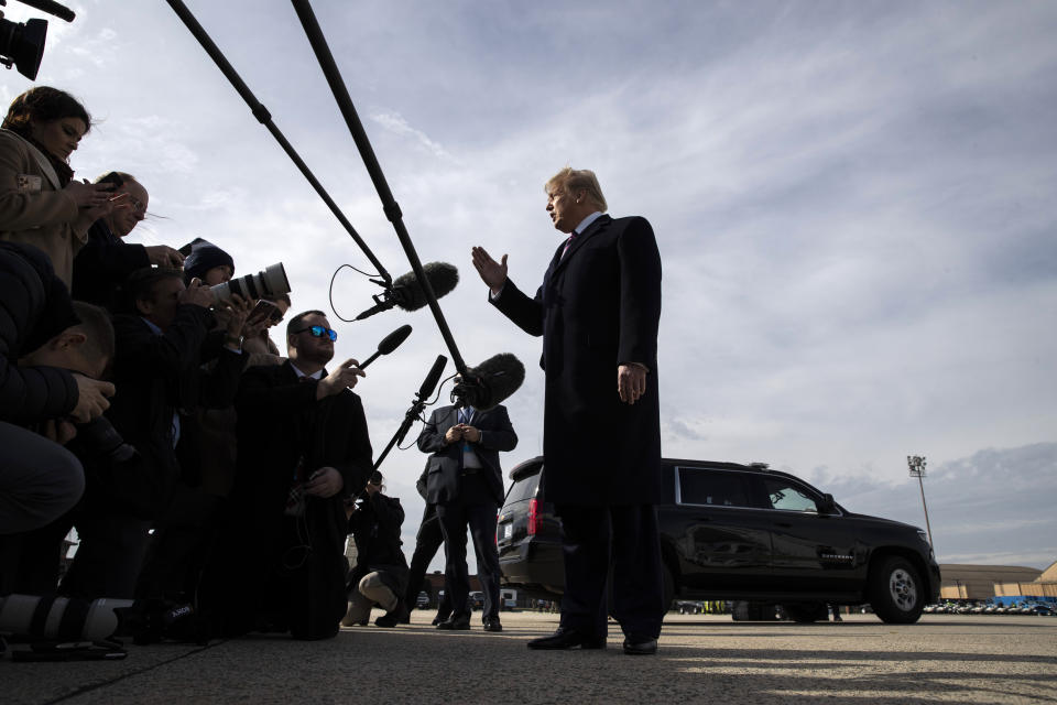 President Donald Trump speaks with reporters as he boards Air Force One as he departs Tuesday, Feb. 18, 2020, at Andrews Air Force Base, Md.(AP Photo/Alex Brandon)