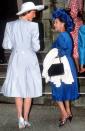 <p>Princess Diana And Princess Margaret wear different shades of blue to James Ogilvy and Julia Rawlinson's wedding at St. Mary The Virgin Church in 1988.</p>