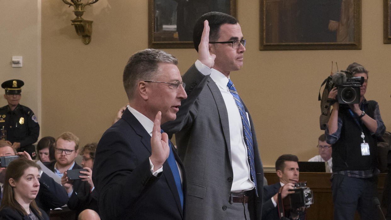 Ambassador Kurt Volker, left, former special envoy to Ukraine, and Tim Morrison, a former official at the National Security Council, are sworn in to testify before the House Intelligence Committee on Capitol Hill in Washington, Tuesday, Nov. 19, 2019, during a public impeachment hearing of President Donald Trump's efforts to tie U.S. aid for Ukraine to investigations of his political opponents. (Photo: J. Scott Applewhite/AP)