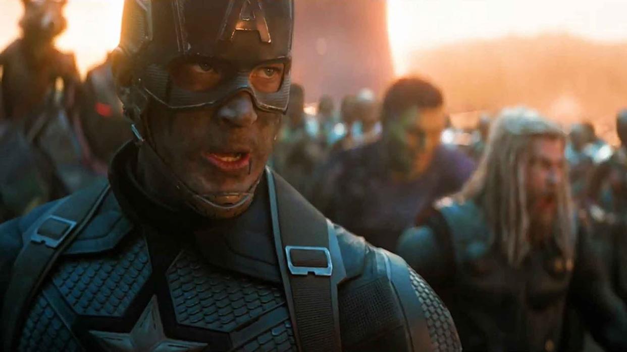  A close up of Captain America with Thor and Hulk in the background during the Assemble scene in Avengers: Endgame. 