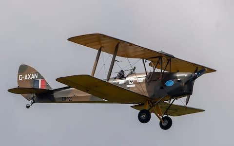 Ms Harrison is flying in her 1942 de Havilland DH82a Tiger Moth, similar to the open cockpit Gypsy Moth flown by Johnson - Credit: Paul Grover