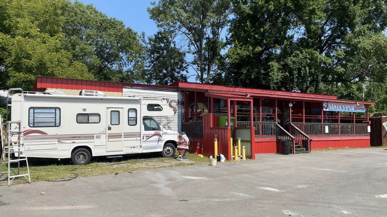 RV outside red trailer bar