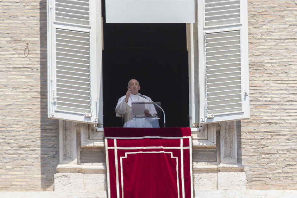 Pope Francis delivers his message after the Angelus noon blessing from the window of his studio overlooking St. Peter's Square at the Vatican, Sunday, July 12, 2020. In a very brief, improvised remark, Pope Francis, speaking from his studio window overlooking St. Peter's Square, said he is “deeply pained” over the decision by Turkey to change the status of Hagia Sophia, which had originally been built as a Christian cathedral, from that of a museum in Istanbul to a mosque. (AP Photo/Alessandra Tarantino)