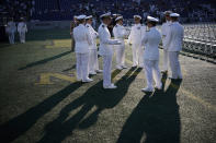 <p>Members of the U.S. Navy wait for the beginning of a U.S. Naval Academy graduation ceremony at the Navy-Marine Corps Memorial Stadium May 25, 2018 in Annapolis, Maryland. More than a thousand students graduated from the Naval Academy this year. (Photo: Alex Wong/Getty Images) </p>