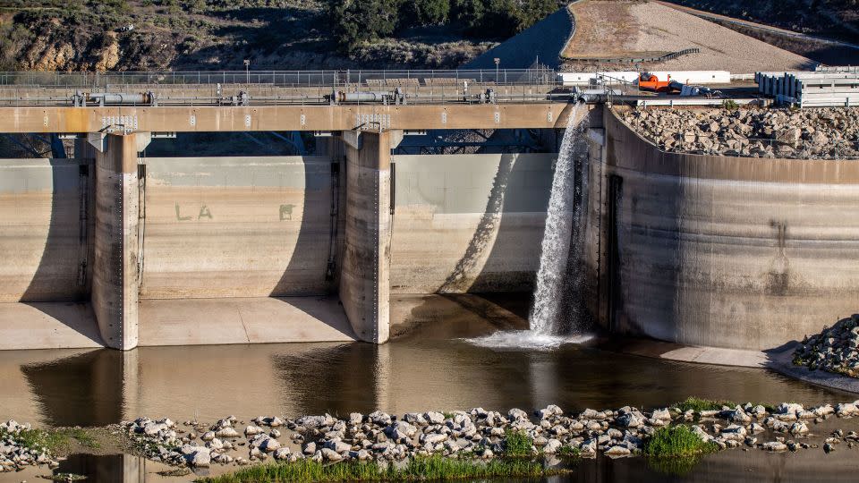 Cachuma Lake, a medium-size reservoir on California's Central Coast, releases water downstream to recharge groundwater for agriculture interests and communities in the Santa Ynez Valley in March 2022. - George Rose/Getty Images