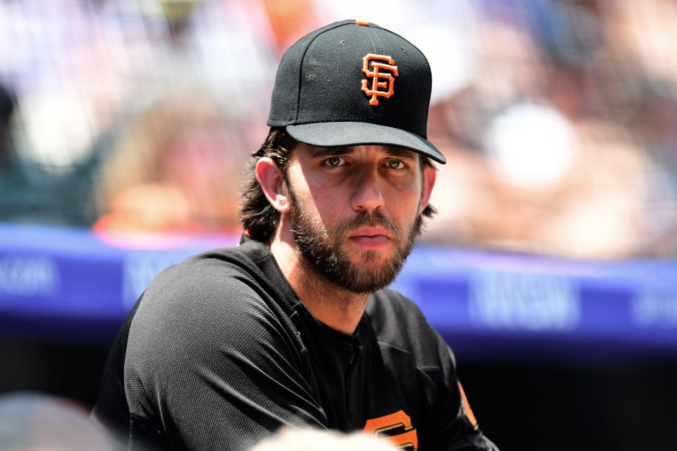 San Francisco Giants starting pitcher Madison Bumgarner (40) looks on during the first inning against the Colorado Rockies at Coors Field. (Ron Chenoy-USA TODAY Sports)