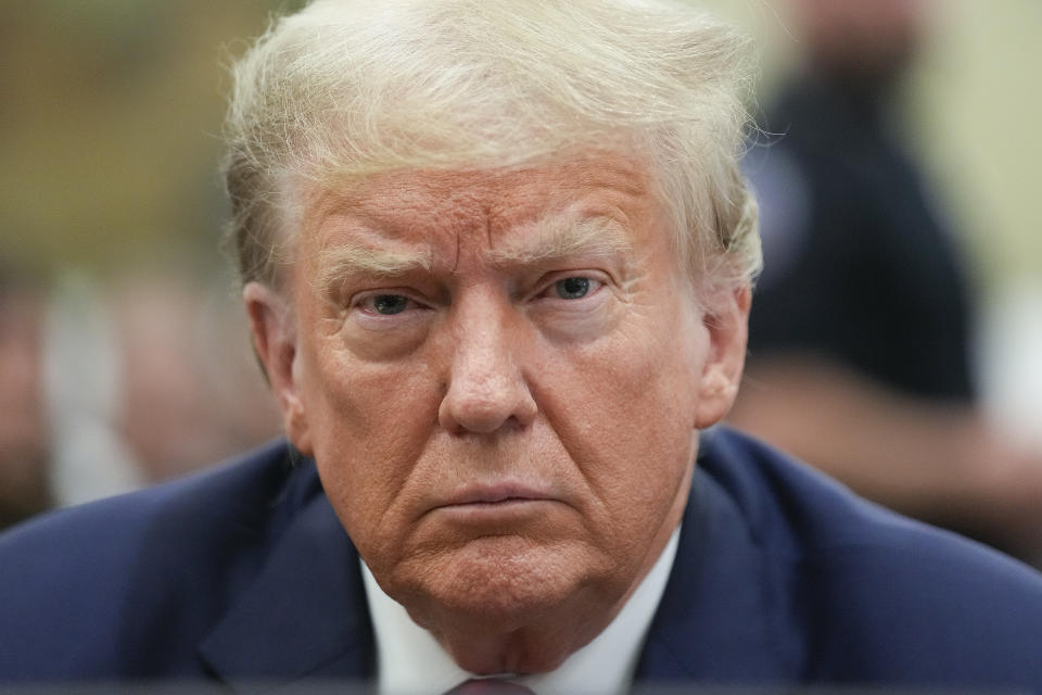 Former President Donald Trump sits in the courtroom before the continuation of his civil business fraud trial at New York Supreme Court, Tuesday, Oct. 3, 2023, in New York. Former President Donald Trump is in a New York court for the second day of his civil business fraud trial. A day after fiery opening statements, lawyers in the case are moving Tuesday to the plodding task of going through years' worth of Trump's financial documents. (AP Photo/Seth Wenig, POOL)