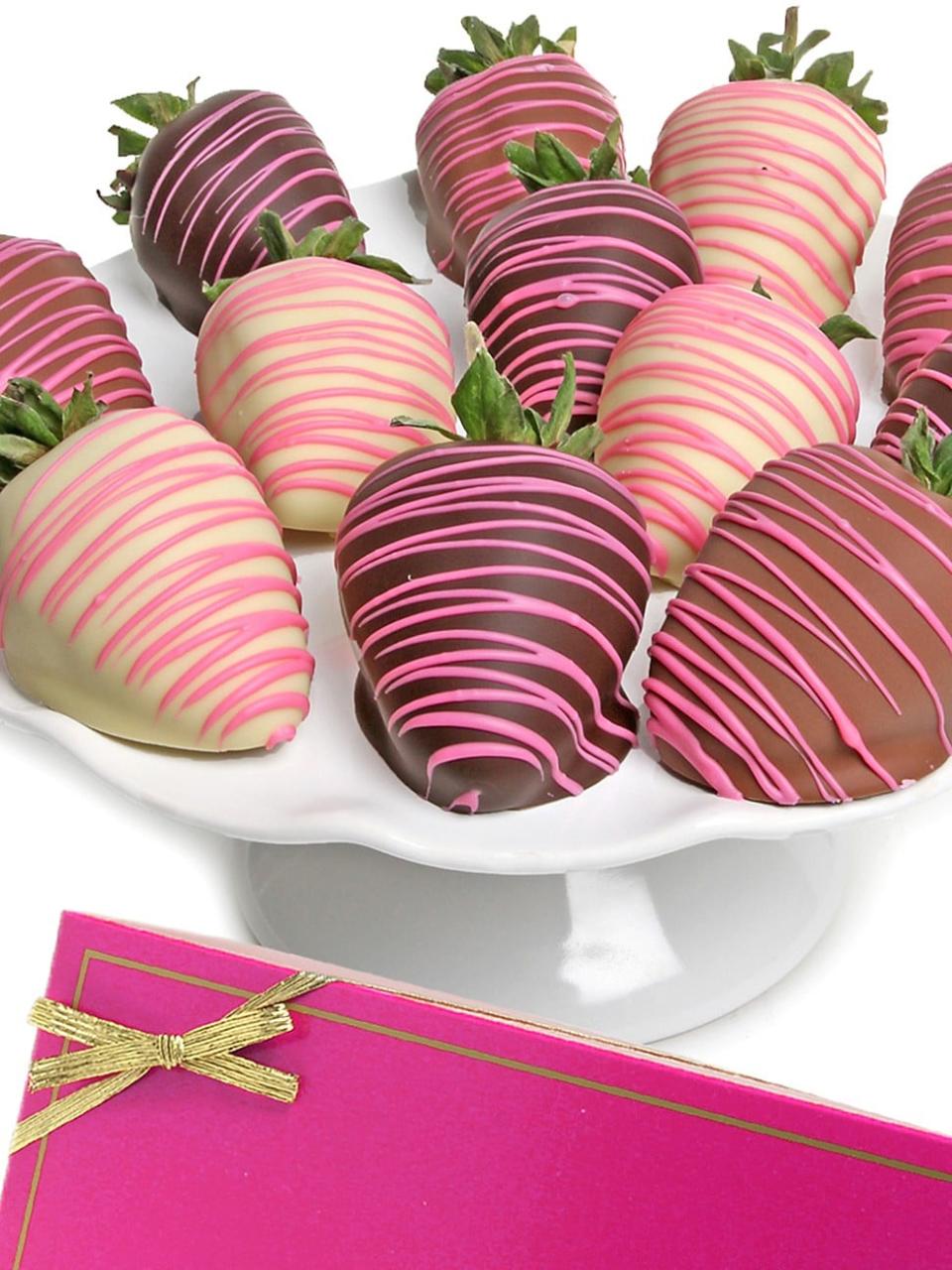 <p><a href="https://go.redirectingat.com?id=74968X1596630&url=https%3A%2F%2Fwww.saksfifthavenue.com%2Fproduct%2Fchocolate-covered-company-pink-belgian-chocolate-covered-strawberries-0400087517662.html&sref=https%3A%2F%2Fwww.townandcountrymag.com%2Fstyle%2Fhome-decor%2Fg26470663%2Fluxury-adult-easter-basket-ideas%2F" rel="nofollow noopener" target="_blank" data-ylk="slk:Shop Now;elm:context_link;itc:0;sec:content-canvas" class="link ">Shop Now</a></p><p>Pink Belgian Chocolate-Covered Strawberries</p><p>saksfifthavenue.com</p><p>$46.00</p>