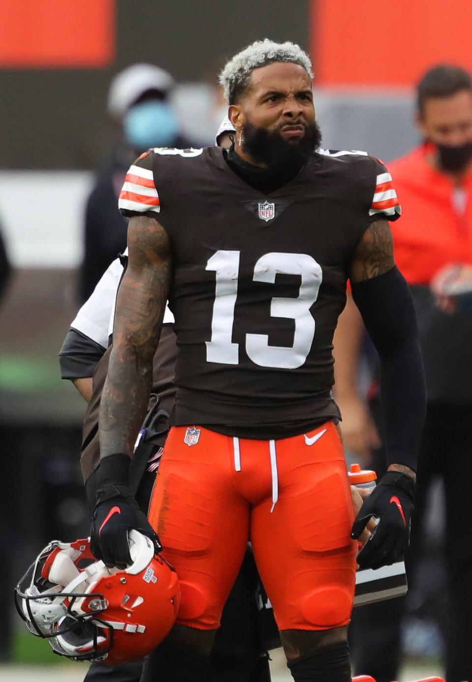 Cleveland Browns wide receiver Odell Beckham Jr. (13) reacts as he watches a replay of his catch on the scoreboard during the second quarter of an NFL football game, Sunday, Oct. 11, 2020, in Cleveland, Ohio.