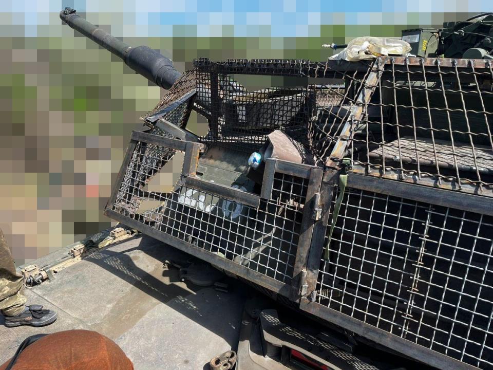 An M1 Abrams tank with protective screens in May.