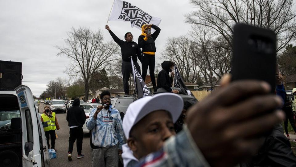 After Brooklyn Center police shot and killed Daunte White during a traffic stop, people gathered to confront the police. (Photo by Stephen Maturen/Getty Images)