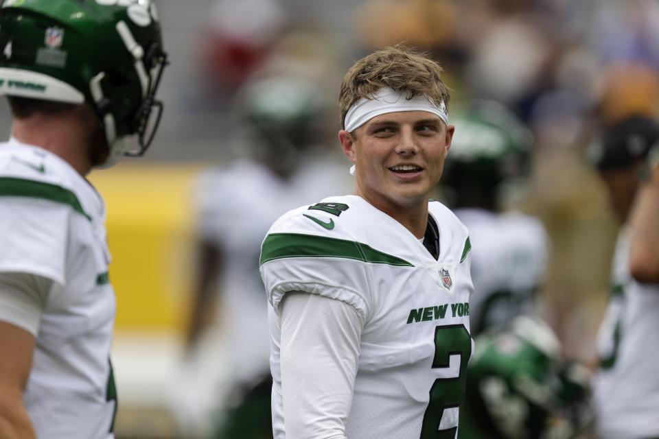 New York Jets' Zach Wilson warms up before a preseason NFL football game against the Green Bay Packers Saturday, Aug. 21, 2021, in Green Bay, Wis. (AP Photo/Matt Ludtke)