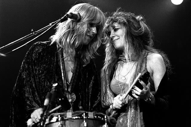 <p>Rick Diamond/Getty</p> Christine McVie and Stevie Nicks in Atlanta in June 1977