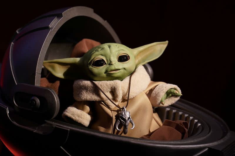 FILE PHOTO: An animatronic Baby Yoda toy is pictured during a "Star Wars" advance product showcase in the Manhattan borough of New York City