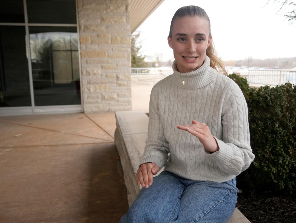 Hamilton High School senior Ella Schumacher, 18, talks about the effects of political division on mental health outside the school in Sussex on Feb. 27.