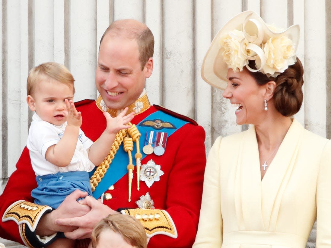 Prince William, the Duke of Cambridge; Catherine, Duchess of Cambridge; and Prince Louis of Cambridge on the balcony of Buckingham Palace in June 2019