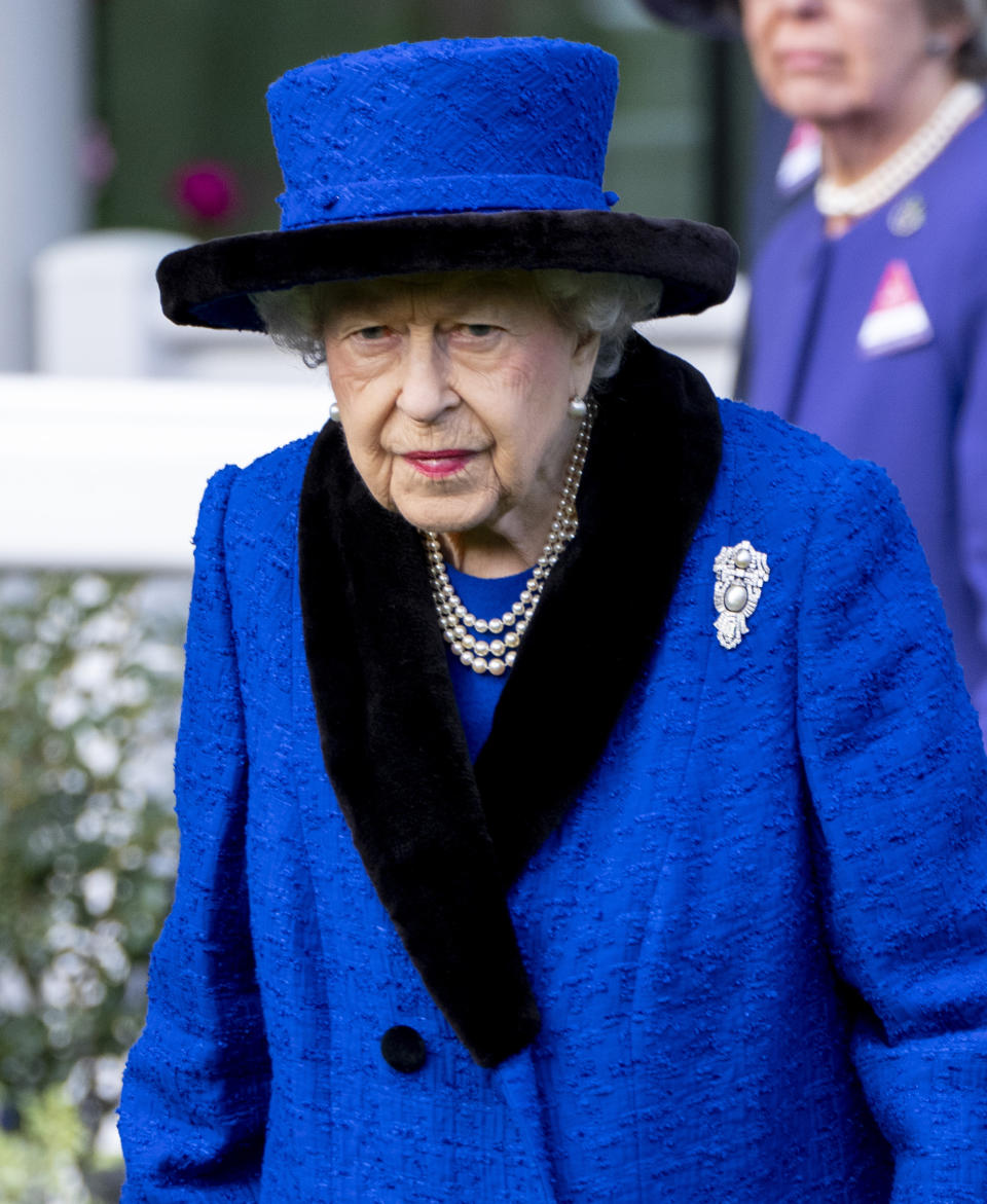 Queen Elizabeth II attends Champions Day at Ascot Racecourse.