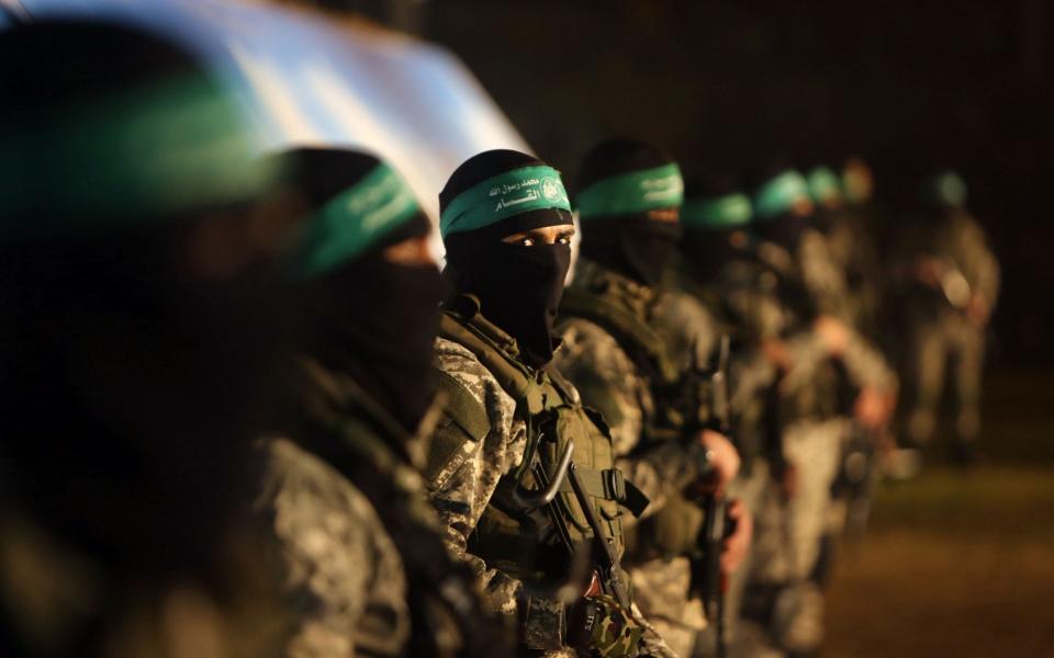 Palestinian members of the Ezzedine al-Qassam Brigades, the armed wing of the Hamas movement, take part in a gathering on January 31, 2016 - AFP