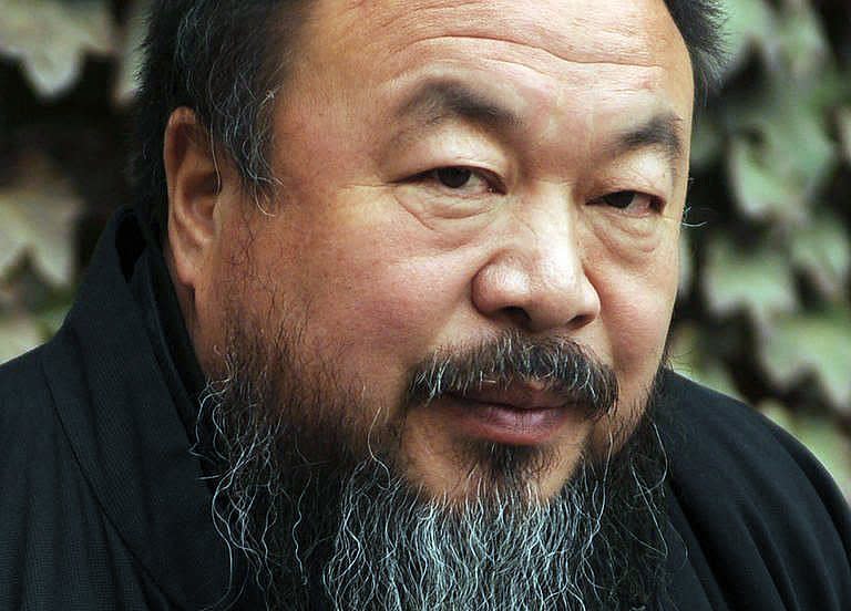 This picture taken on November 7, shows Chinese artist Ai Weiwei in the courtyard of his home in Beijing where he remains under house arrest. The State Department's annual survey said that China's human rights record was on a "negative trend" in 2010, with clampdowns at sensitive points of the year and "severe repression" in the Tibet and Xinjiang regions