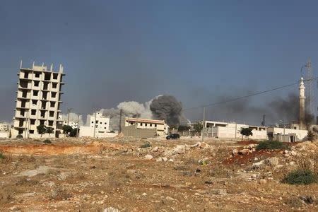 Smoke rises after an airstrike on the rebel held al-Rashideen neighbourhood, Western Aleppo province, Syria July 31, 2016. REUTERS/Ammar Abdullah