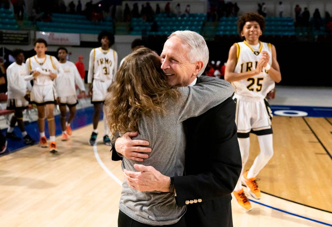 Irmo head coach Tim Whipple is congratulated following his win over Hartsville at the Florence Center in Florence on Friday, February 24, 2023.