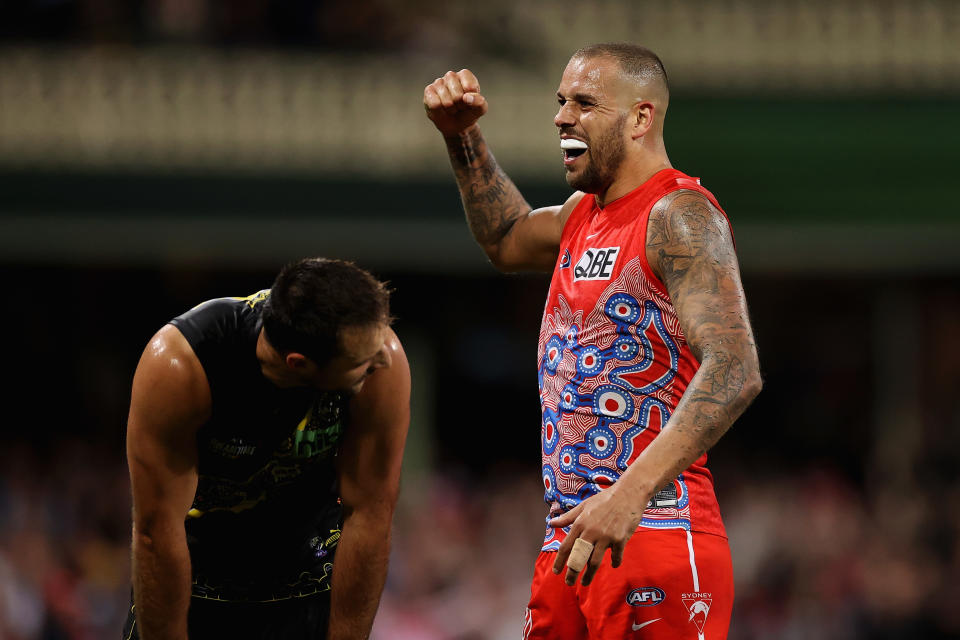 Lance Franklin (pictured) celebrates winning against the Richmond Tigers.