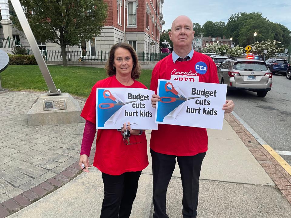 Gloria Diamond and Michael Casey of the Connecticut Education Association protested outside of Norwich City Hall Monday against Norwich currently budgeting over $3 million less than Norwich Public Schools requested.