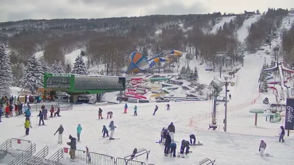 Powder chasing skiers and snowboarders enjoy the fresh snow at Camelback Resort (11:30 AM ET)<p>Camelback Resort Webcams</p>