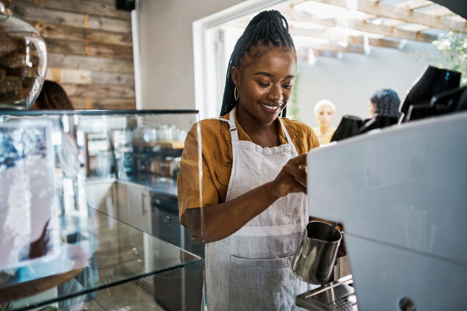 A barista working in a coffee shop