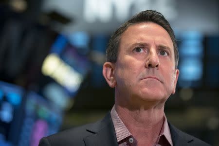 FILE PHOTO - Target Corp. CEO, Brian Cornell speaks during an interview on the floor of the New York Stock Exchange November 28, 2014. REUTERS/Brendan McDermid