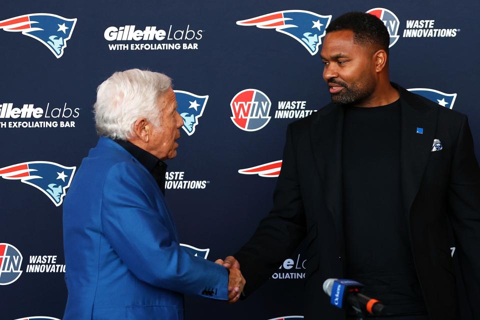 FOXBOROUGH, MASSACHUSETTS - JANUARY 17: (L-R) Owner Robert Kraft and newly appointed head coach Jerod Mayo of the New England Patriots shake hands during a press conference at Gillette Stadium on January 17, 2024 in Foxborough, Massachusetts. (Photo by Maddie Meyer/Getty Images)