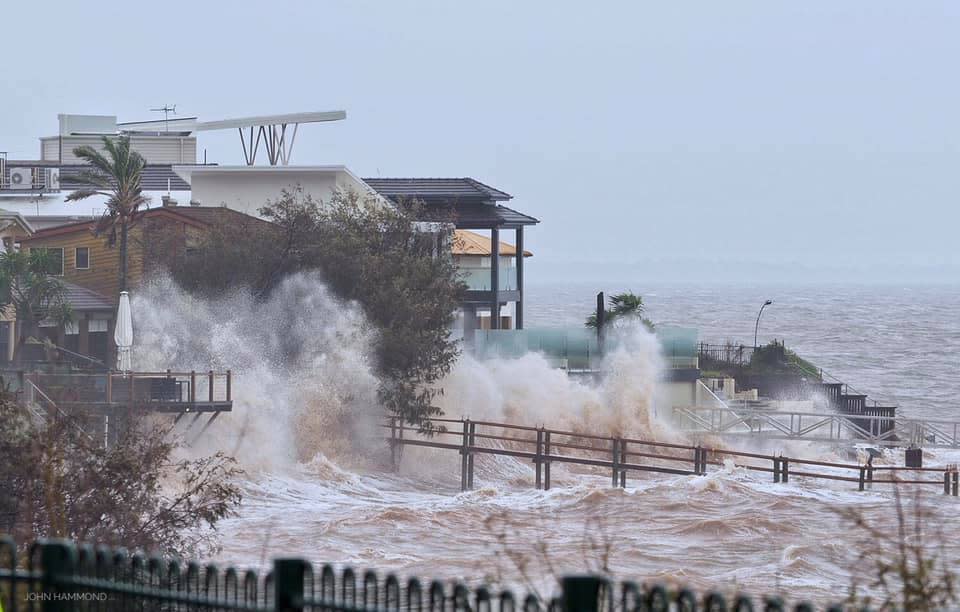 Waves slamming into restaurant in Scarborough, in Redcliffe, NSW.