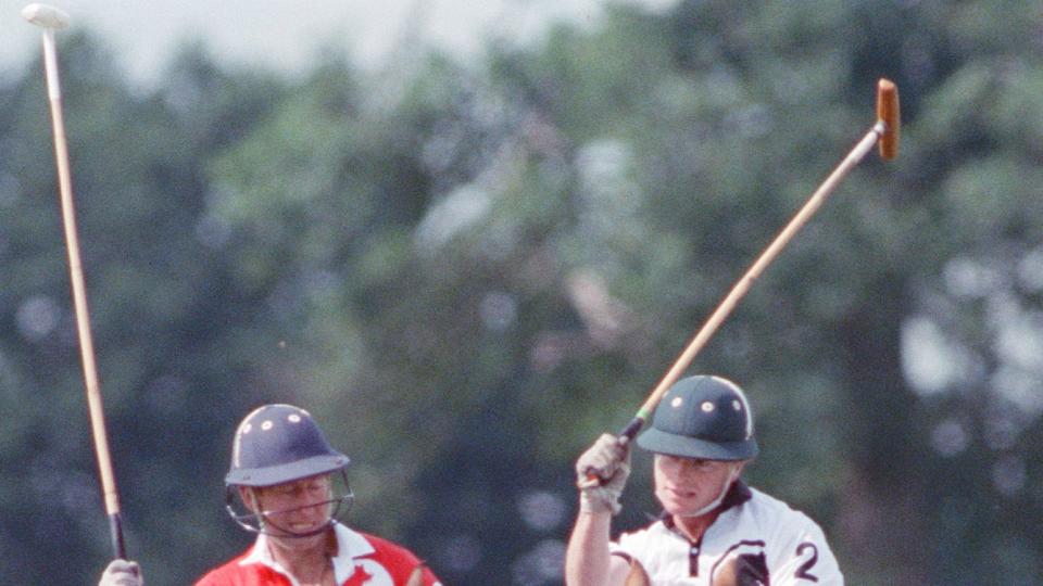 Prince Charles (Red shirt wearing number 3) was locked in a fierce battle with Princess Diana's friend Major James Hewitt (white shirt wearing number 2)