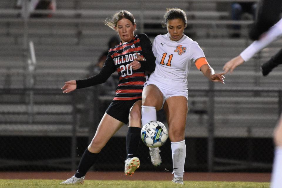 Oak Hills' Mia Bevan and Apple Valley’s Alia Collins battle for possession of the ball during the second half on Friday, Jan. 19, 2024. Apple Valley beat Oak Hills 1-0 and improved to 6-0 in the Mojave River League standings.