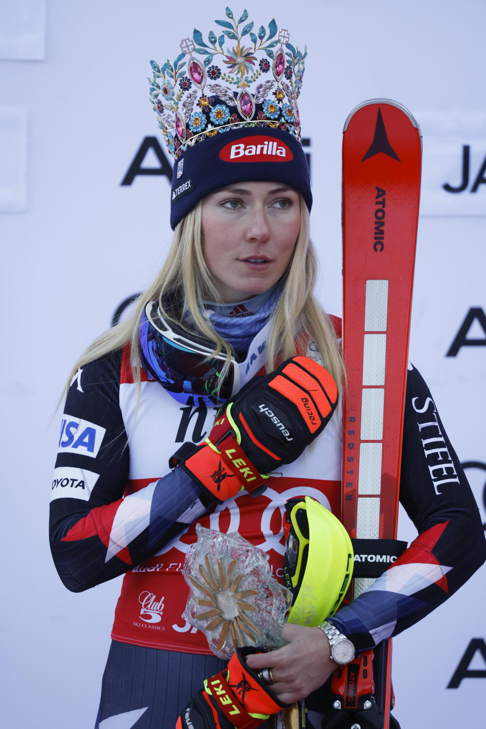 United States' Mikaela Shiffrin celebrates on the podium after winning an alpine ski, women's World Cup slalom race, in Jasna, Slovakia, Sunday, Jan. 21, 2024. (AP Photo/Giovanni Maria Pizzato)