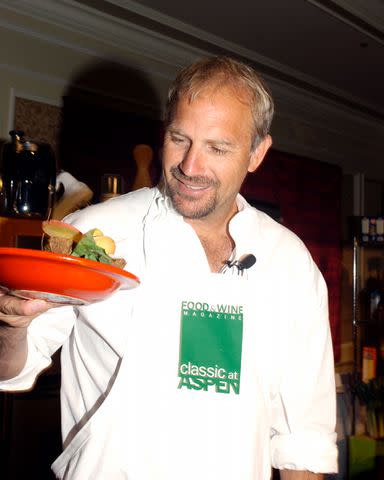 <p>Food & Wine Archives</p> Kevin Costner takes the stage to compete against chefs at the Classic