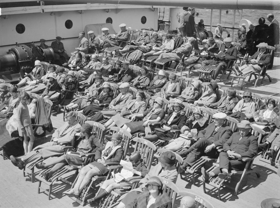 Third-class passengers making use of the deck chairs on the Canadian Pacific liner Duchess of Bedford during a transatlantic voyage in 1931.

Photo by Edward G Malindine/Hulton Archive via Getty Images