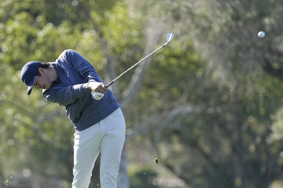 Davis Thompson hits from the 15th tee during the American Express golf tournament on the La Quinta Country Club Course Thursday, Jan. 19, 2023, in La Quinta, Calif. (AP Photo/Mark J. Terrill)